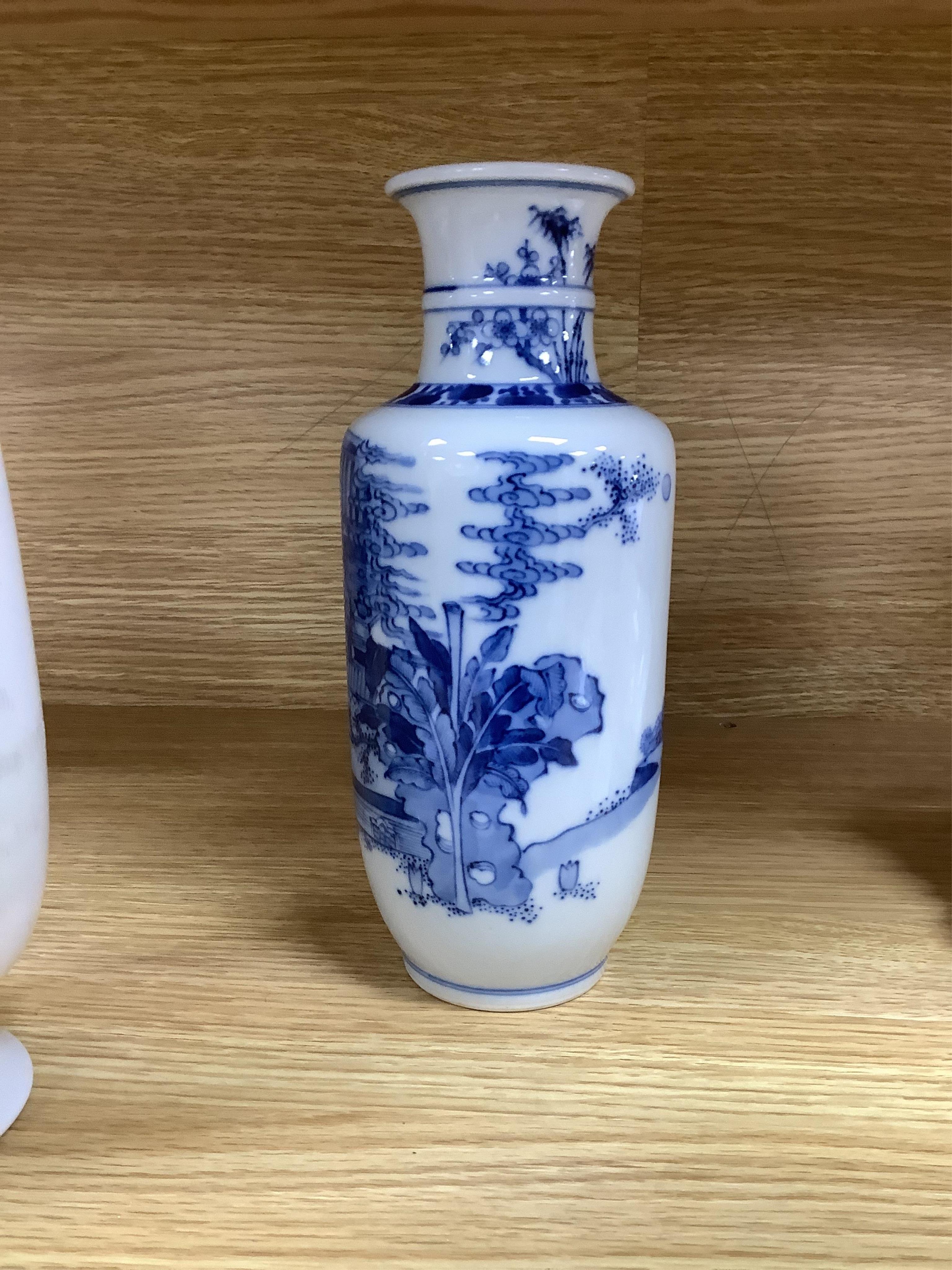 A Chinese blue and white vase and an enamelled figurative porcelain example, tallest enamel vase 29cm high. Condition - good